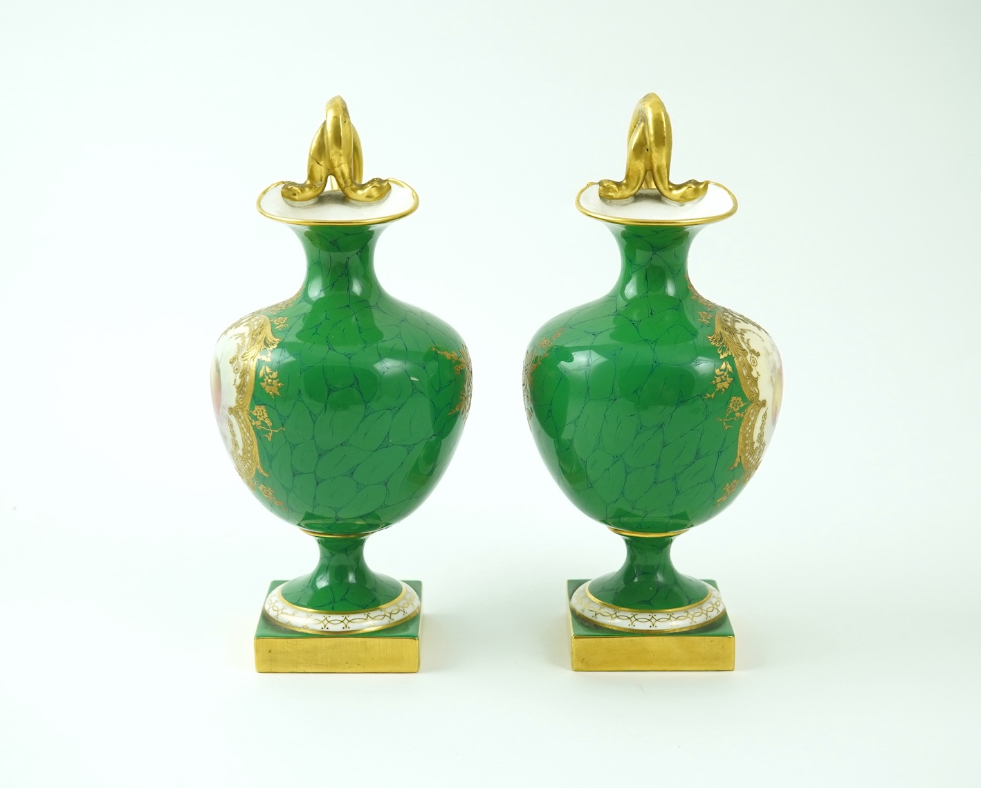A pair of Royal Worcester fruit painted ewers, by R. Sebright, c.1903